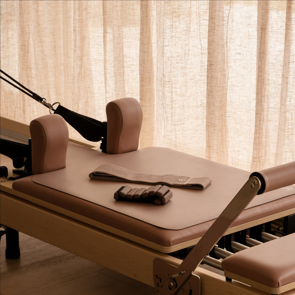 Dusty Rose Reformer Pack with Mat and Weighted Bands - Three Quarter View | Your Reformer