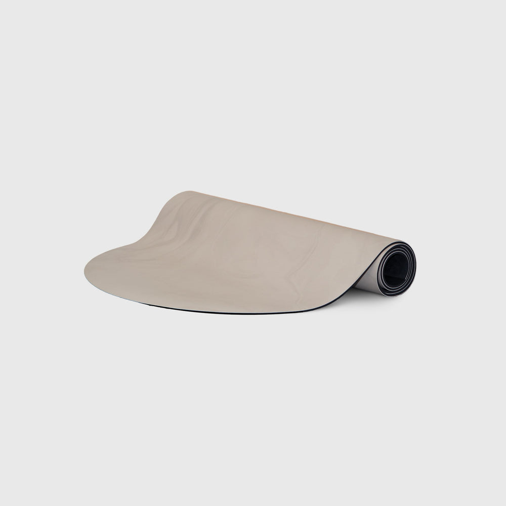 Ghosted Yoga Mat - Beige Non-Slip Pilates Mat Partially Rolled | Your Reformer