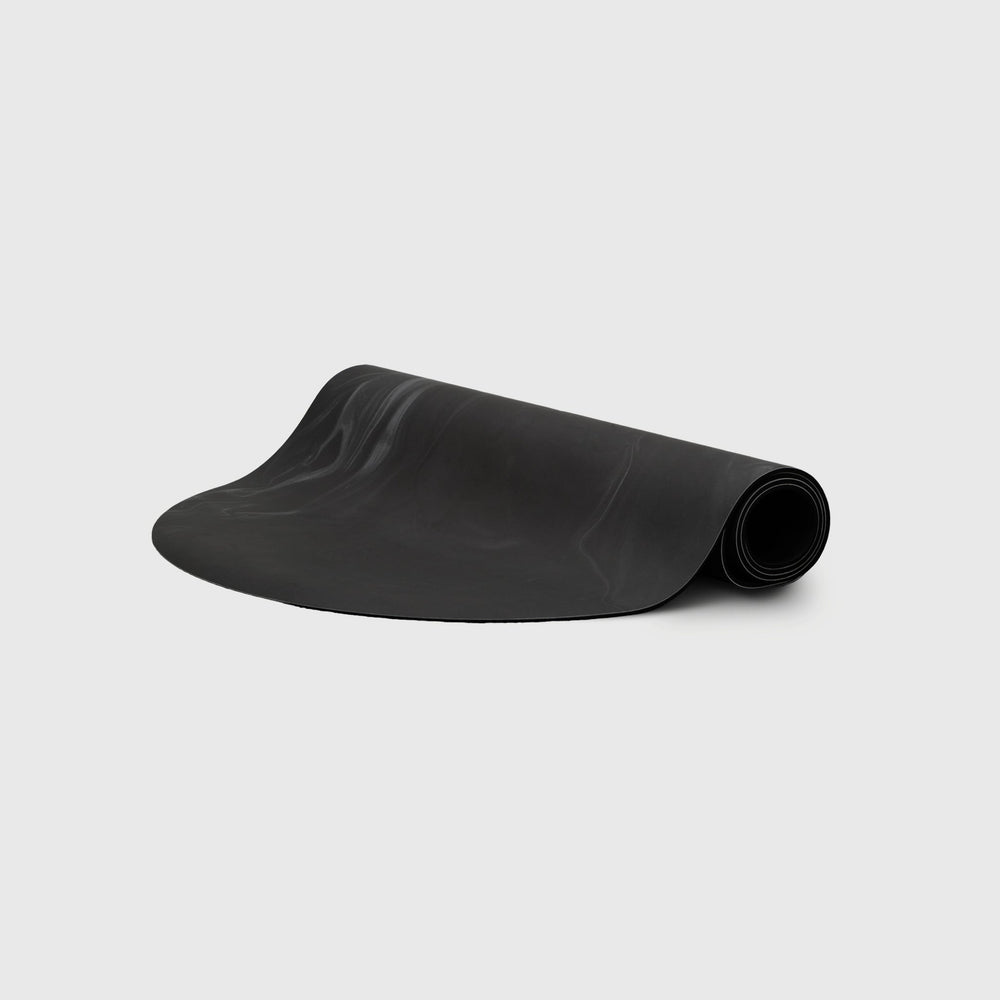 Ghosted Yoga Mat Black Wash - Dark Non-Slip Pilates Mat Partially Rolled | Your Reformer