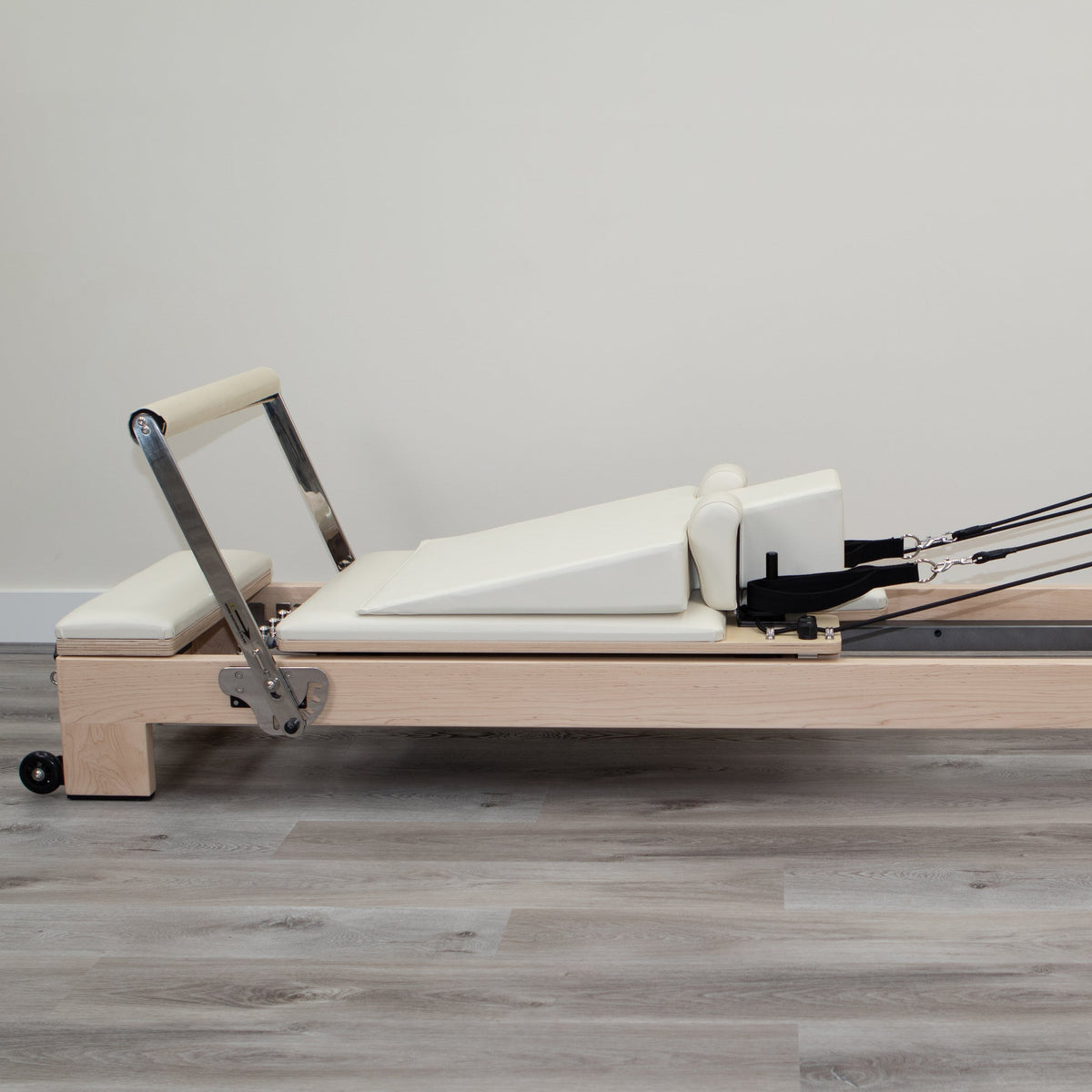 Ivory Pregnancy Wedge on Pilates Reformer - Side Profile | Your Reformer
