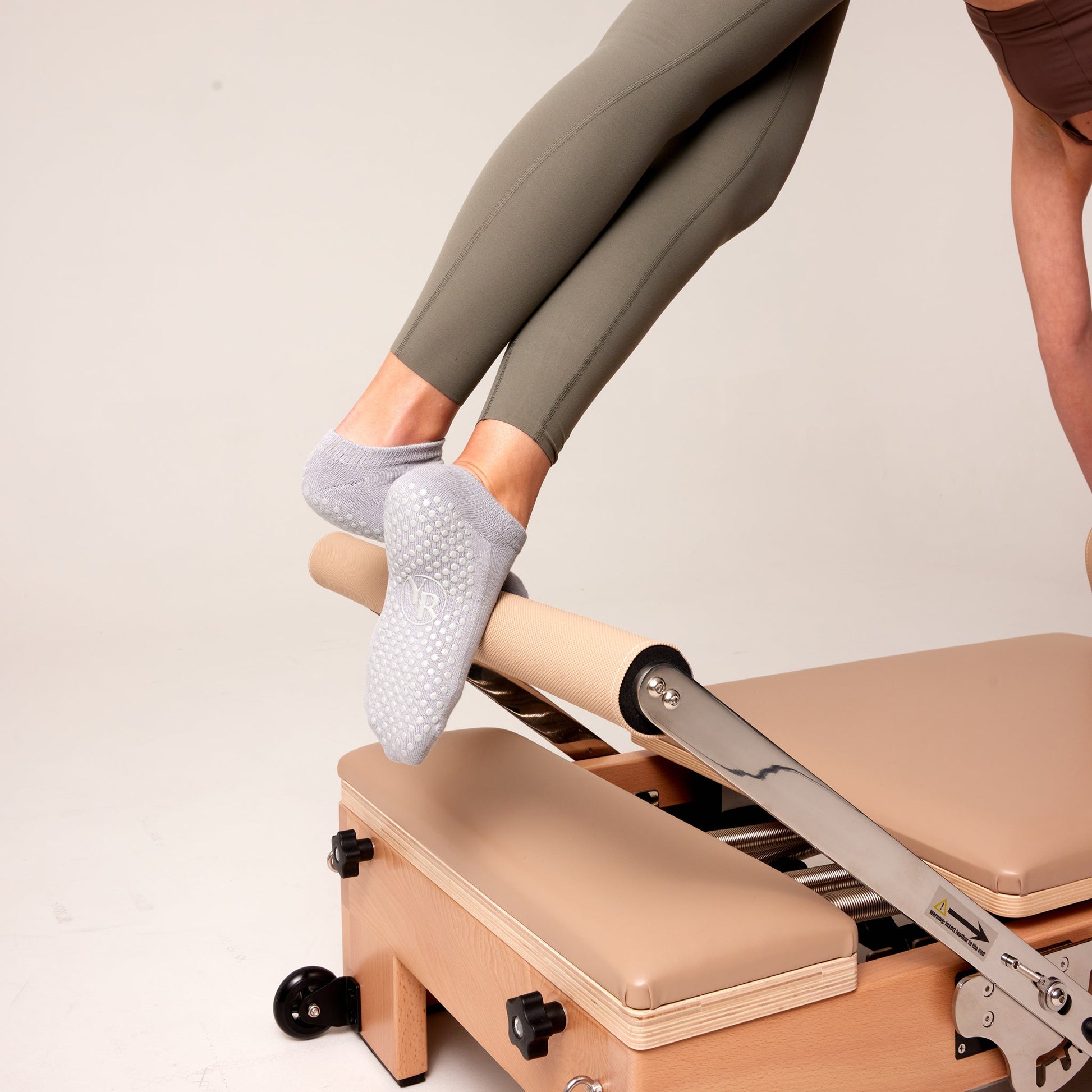 Why You Need Grip Socks for Reformer Pilates – PilatesHoney