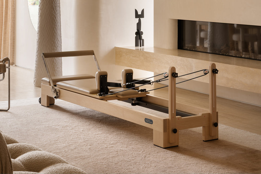 Maple Wood YR Studio Reformer - Front Angle View in Modern Living Room | Your Reformer